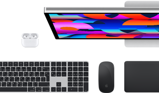 Mac accessories: AirPods headphones, Studio Display, MagSafe charging cable, Magic Keyboard with Touch ID, Magic Mouse, Magic Trackpad, all in Space Black